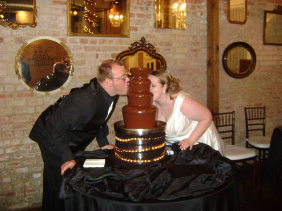 Bride and Groom Enjoying a Chocolate Fountain